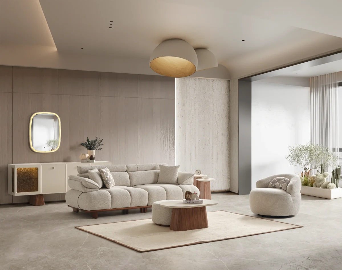 Experience comfort with the Nola Sofa Set. Its elegant fabric and curved silhouette offer a perfect blend of modern aesthetics and comfortable living.