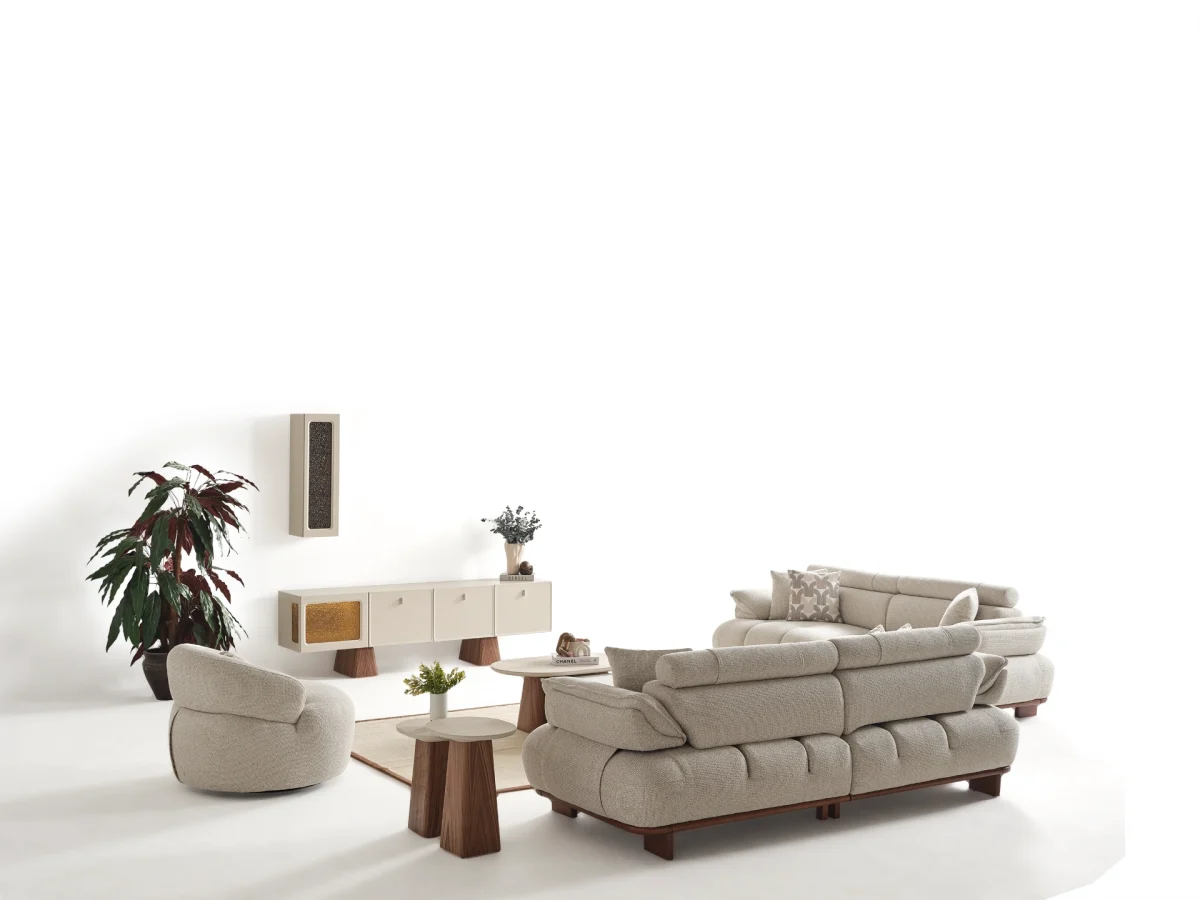 Experience comfort with the Nola Sofa Set. Its elegant fabric and curved silhouette offer a perfect blend of modern aesthetics and comfortable living.