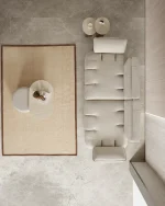 The Nola Sofa adds an architectural touch to your living room with its flowing lines and tactile richness. Experience comfort wrapped in the season's trendiest fabric.