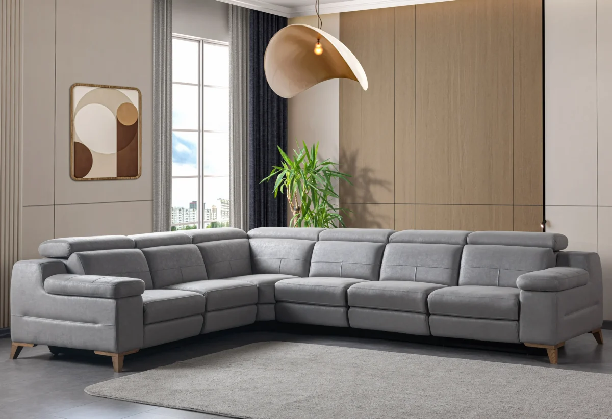 A modern L-shaped sectional sofa featuring integrated recliner functions, adjustable multi-position headrests, plush cushioned armrests, and subtle wooden support legs in a contemporary interior setting.