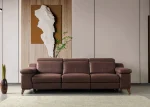 A modern multi-seater recliner sofa featuring adjustable headrests, extendable footrests, wide plush armrests, and a rich textured leatherette finish in a contemporary living room setting.