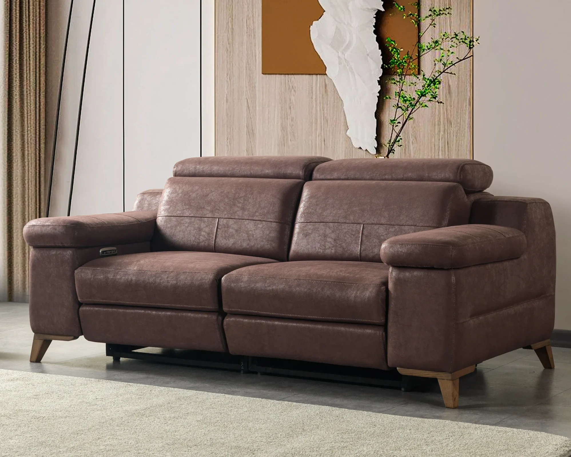 Relaxo Two Seater Recliner Comfort high quality Living room 1 A modern multi-seater recliner sofa featuring adjustable headrests, extendable footrests, wide plush armrests, and a rich textured leatherette finish in a contemporary living room setting.