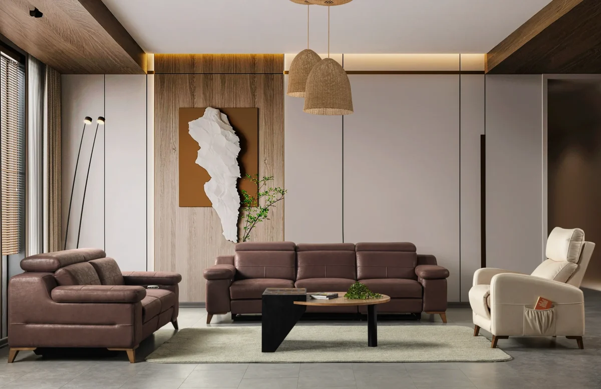 A modern multi-seater recliner sofa featuring adjustable headrests, extendable footrests, wide plush armrests, and a rich textured leatherette finish in a contemporary living room setting.
