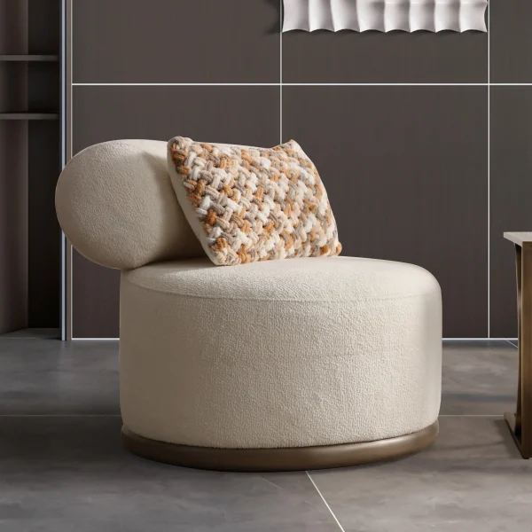 The Rumi Armchair in a sophisticated, contemporary interior with dark paneled walls and warm lighting, creating an atmosphere of deep harmony and artistic tranquility.