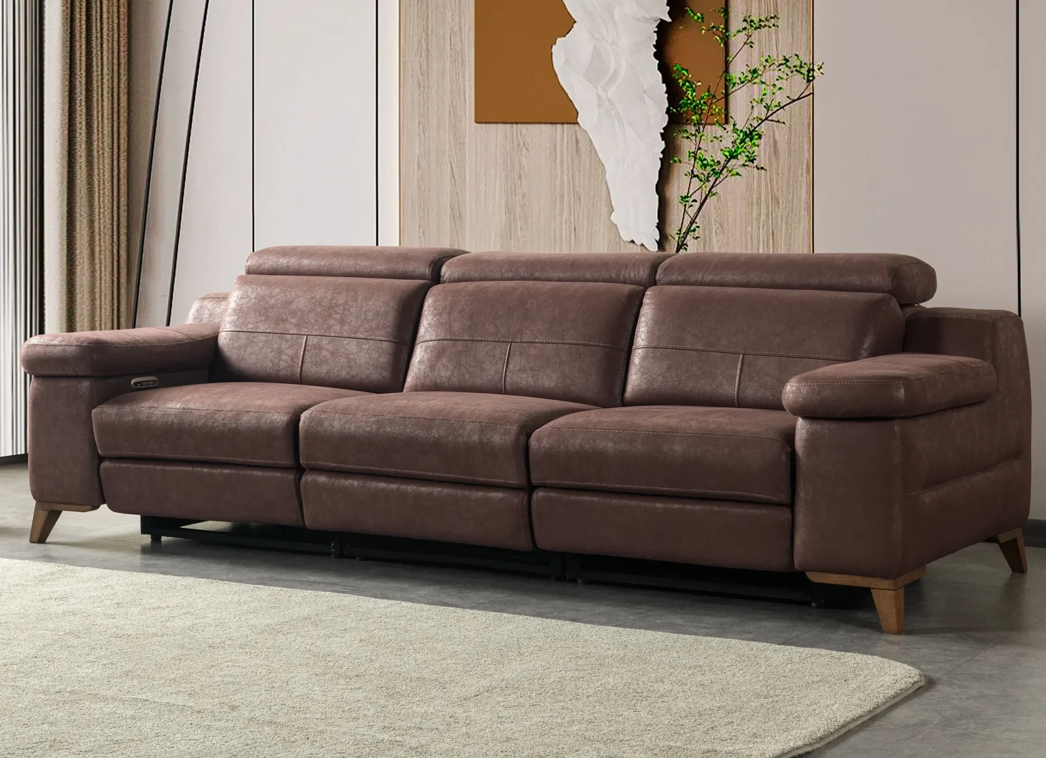 Serena Three Seater Recliner Comfort high quality Living room 2 A modern multi-seater recliner sofa featuring adjustable headrests, extendable footrests, wide plush armrests, and a rich textured leatherette finish in a contemporary living room setting.