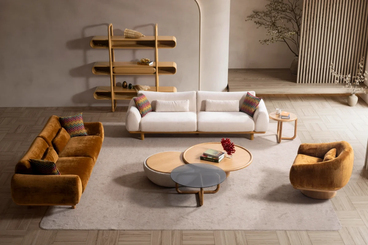 The Thalia Sofa Set redefines modern elegance with its fluid, organic silhouette and tactile fabric. A masterpiece of comfort designed for sophisticated homes.