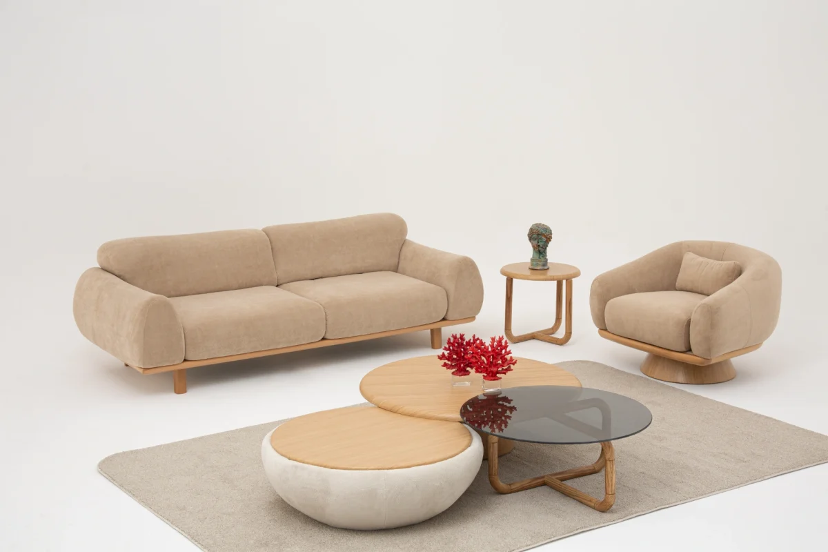The Thalia Sofa Set redefines modern elegance with its fluid, organic silhouette and tactile fabric. A masterpiece of comfort designed for sophisticated homes.
