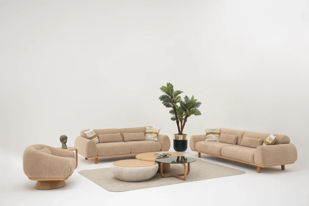 The Thalia Sofa Set redefines modern elegance with its fluid, organic silhouette and tactile fabric. A masterpiece of comfort designed for sophisticated homes.