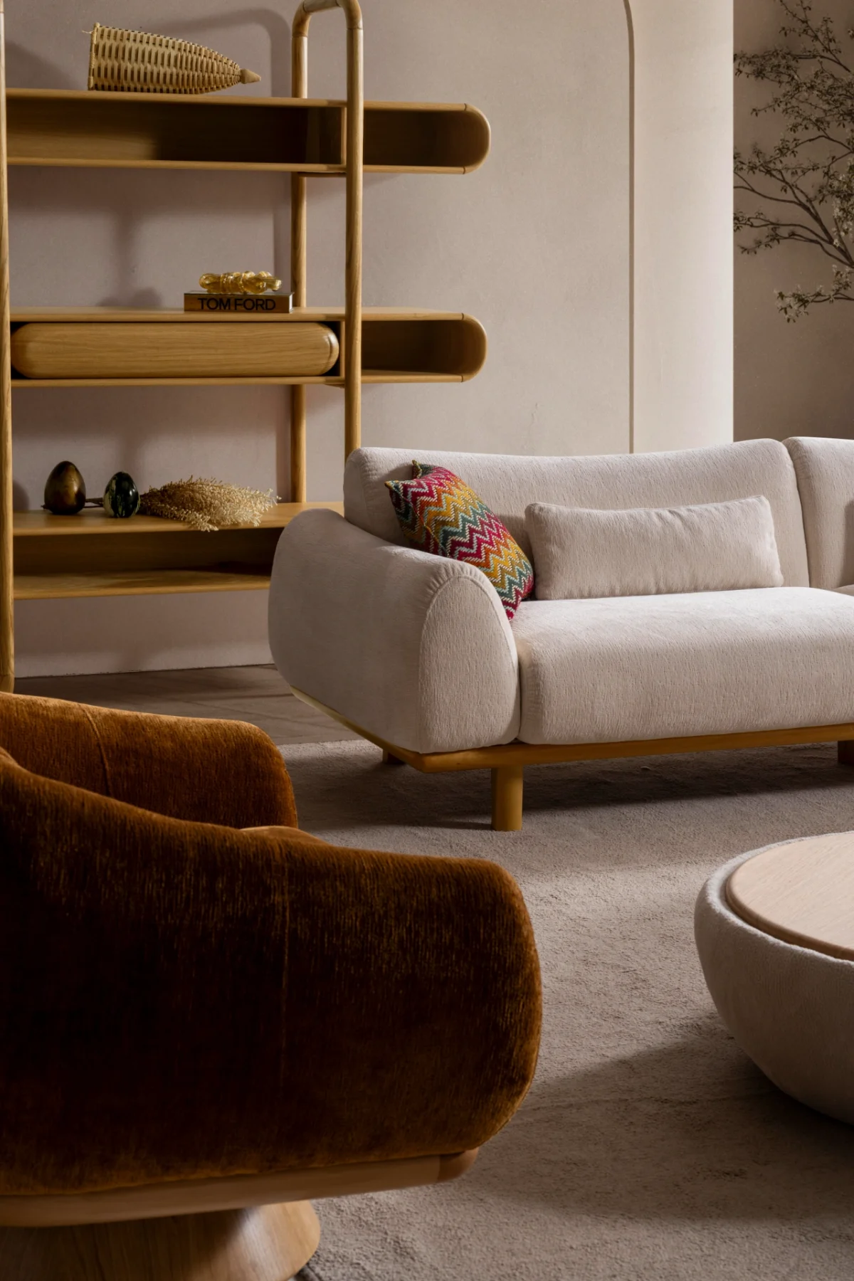The Thalia Sofa combines organic, rounded lines with the rich texture of premium fabric. A bold piece that brings modern warmth to any living room.