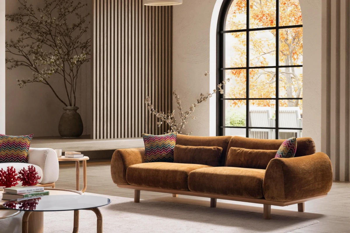 The Thalia Sofa combines organic, rounded lines with the rich texture of premium fabric. A bold piece that brings modern warmth to any living room.