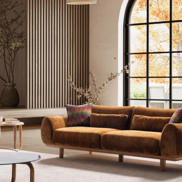 The Thalia Sofa combines organic, rounded lines with the rich texture of premium fabric. A bold piece that brings modern warmth to any living room.