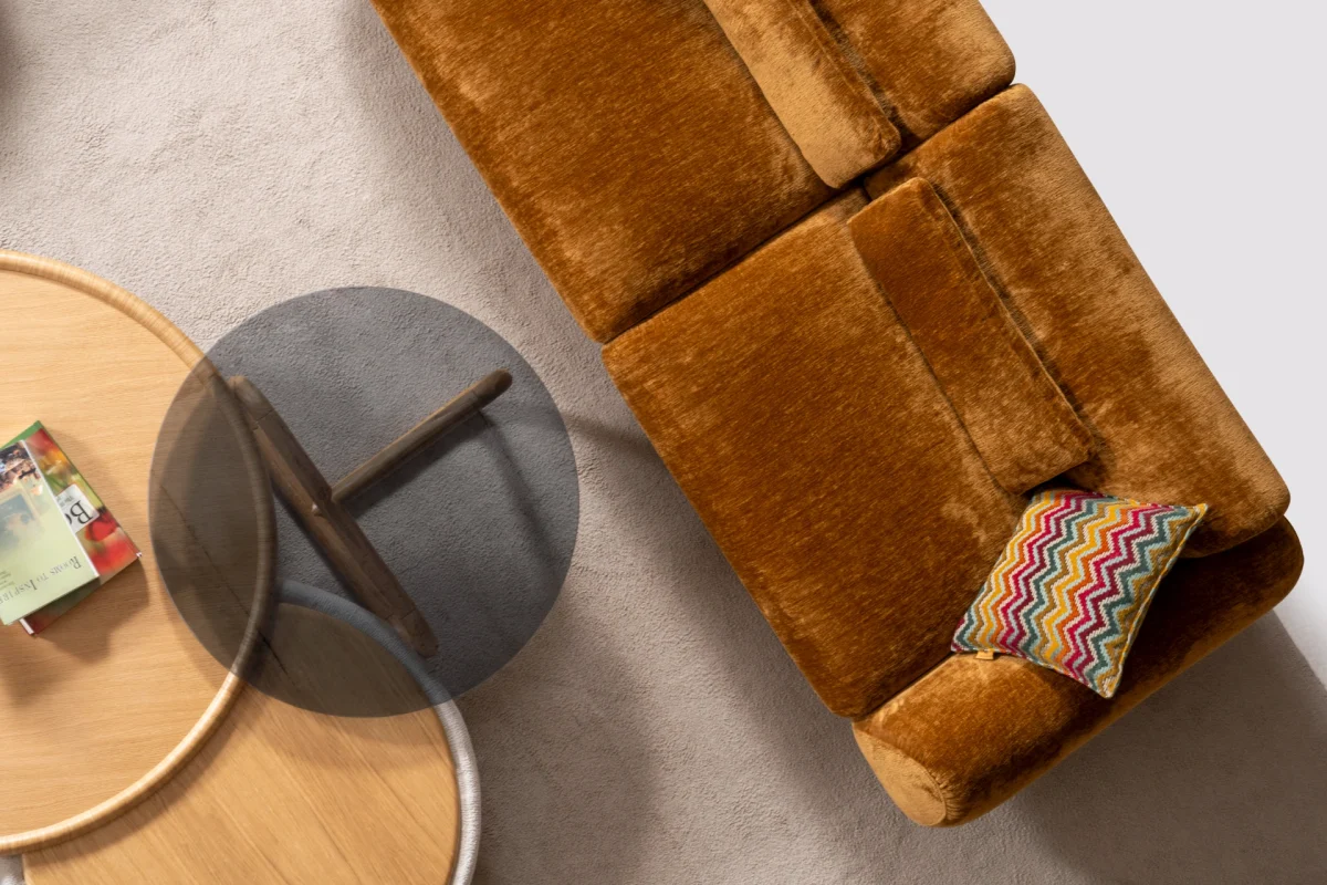 The Thalia Sofa combines organic, rounded lines with the rich texture of premium fabric. A bold piece that brings modern warmth to any living room.