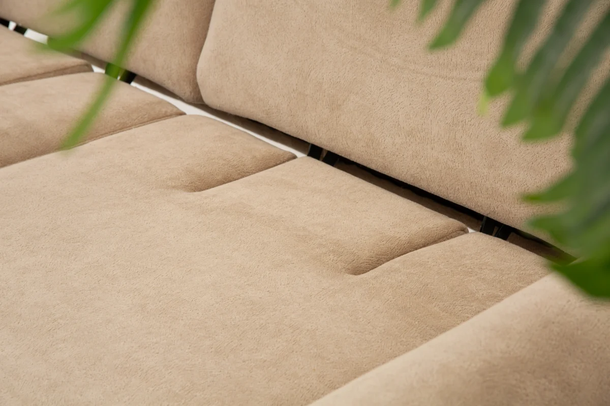 The Thalia Sofa combines organic, rounded lines with the rich texture of premium fabric. A bold piece that brings modern warmth to any living room.