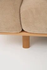 The Thalia Sofa combines organic, rounded lines with the rich texture of premium fabric. A bold piece that brings modern warmth to any living room.