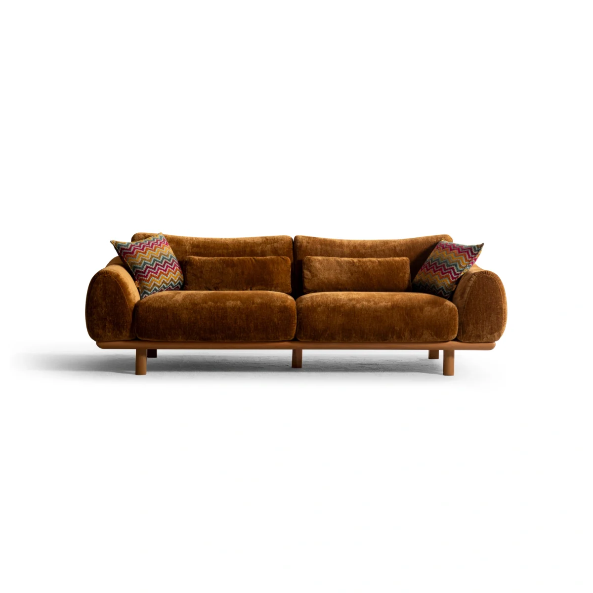 The Thalia Sofa combines organic, rounded lines with the rich texture of premium fabric. A bold piece that brings modern warmth to any living room.