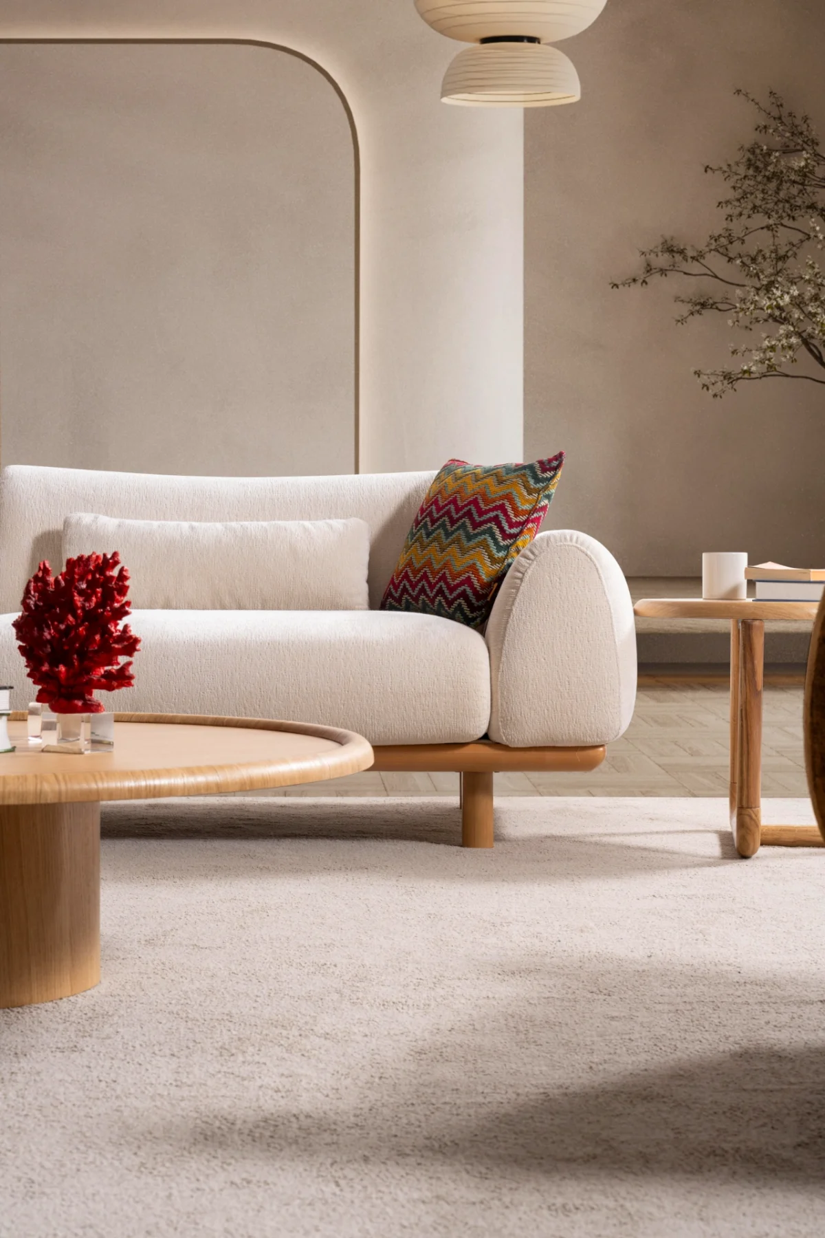 The Thalia Sofa combines organic, rounded lines with the rich texture of premium fabric. A bold piece that brings modern warmth to any living room.