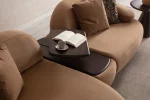 Tolia Chaise Corner Sofa – 3 Module (Wooden Middle Module) featuring soft beige seating units, a central wooden console table, and comfortable throw cushions in a warm interior design setup.