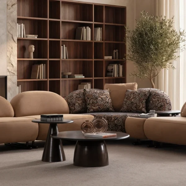 Tolia Corner Sofa - 4 Modules five-piece modular curved corner sofa featuring warm beige seating, patterned accent cushions, and an integrated wooden console table.