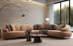 Tolia Corner Sofa - 4 Modules four-piece modular curved corner sofa in warm beige upholstery, featuring patterned accent pillows and a distinct corner module set against a modern wall.