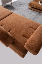 Modern living room featuring the Troyas sofa set in a warm terracotta hue, showcasing soft curves and a textured finish for a cozy, contemporary aesthetic – SofaTurkey.