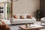 A harmonized Troyas sofa set showcasing a visual dialogue between warm terracotta and ivory tones, featuring matching organic curved silhouettes in a luxury contemporary setting – SofaTurkey.