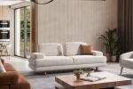 Troyas modern sofa set featuring a curved silhouette and rich textured fabric in terracotta and ivory cream, styled for a luxury contemporary living room – SofaTurkey.