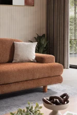 Modern living room featuring the Troyas sofa set in a warm terracotta hue, showcasing soft curves and a textured finish for a cozy, contemporary aesthetic – SofaTurkey.