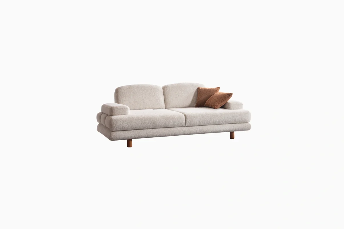 Troyas modern sofa set featuring a curved silhouette and rich textured fabric in terracotta and ivory cream, styled for a luxury contemporary living room – SofaTurkey.