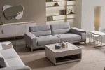 Velora Sofa modern cream living room couch featuring plush channel-tufted back cushions and integrated adjustment mechanism.