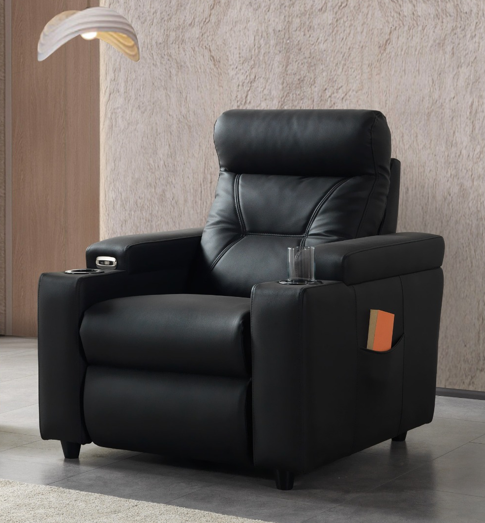 Zero-vip-single-recliner-01 A modern single-seater power recliner armchair featuring a high pillow backrest, integrated cup holders in the wide armrests, side storage pocket, and sleek black upholstery.