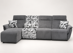 A modern sectional power recliner sofa featuring an integrated chaise lounge, patterned accent backrest and seat section, soft throw cushions, and smooth high-back plush cushioning set against a clean backdrop.